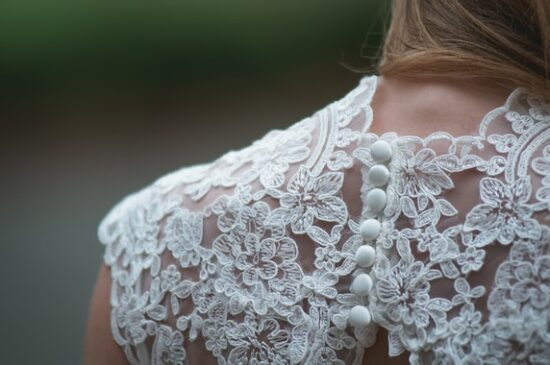 The Woman in White by Wilkie Collins woman wearing white lace dress
